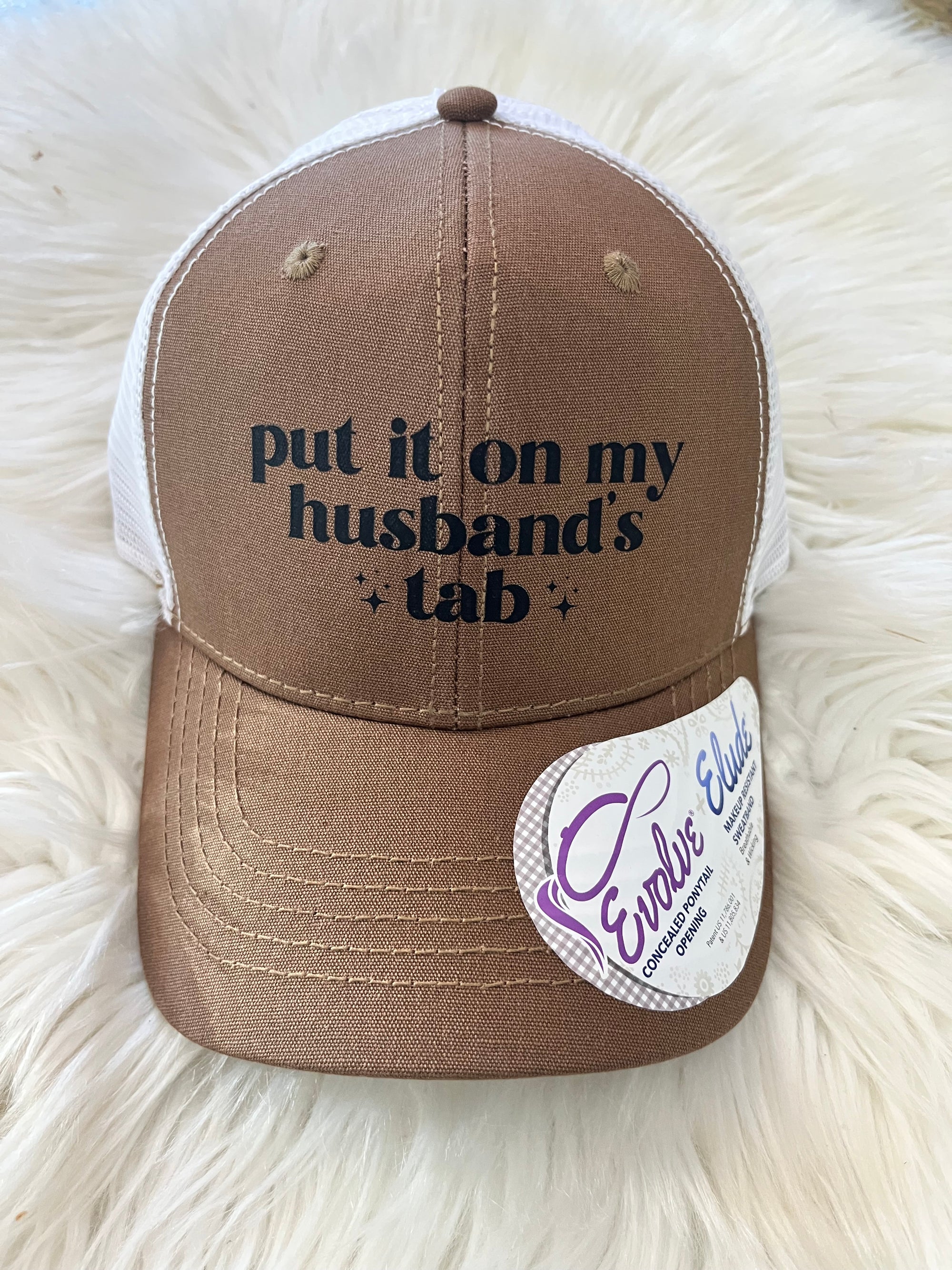 Put it on my husbands tab camel/white hat